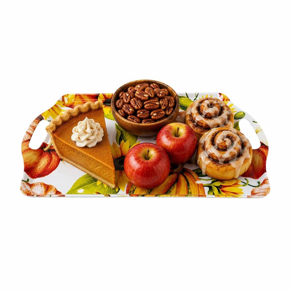 Harvest-themed autumn pumpkin and sunflower melamine serving tray with handles, beautifully styled with pumpkin pie, cinnamon rolls, and red apples.