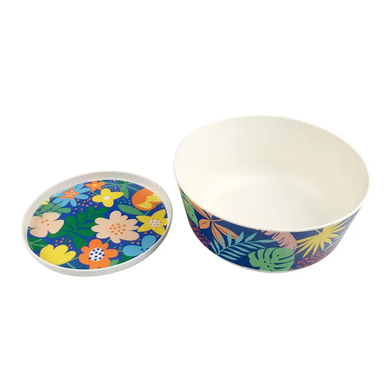 Tropical botanical and palm leaves pattern melamine salad serving bowl with a removable flat decorated lid and clean cream-white interior.